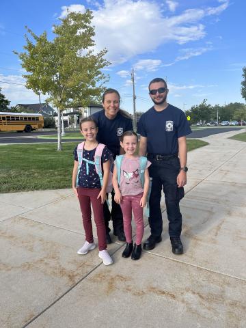 Students being welcomed to school from the Mapleton Fire Department.