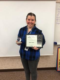 Ms. Bailey receives the Crystal Apple Award