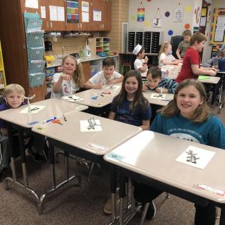 Miss Johnson's 4th Grade class making fun creatures to show their shadows for groundhog day.