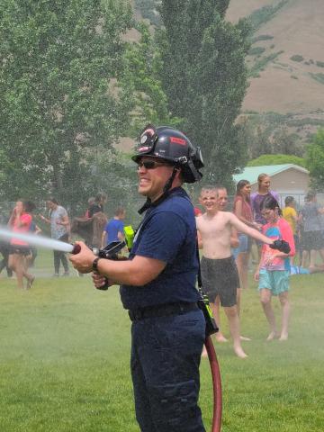 fireman spraying water