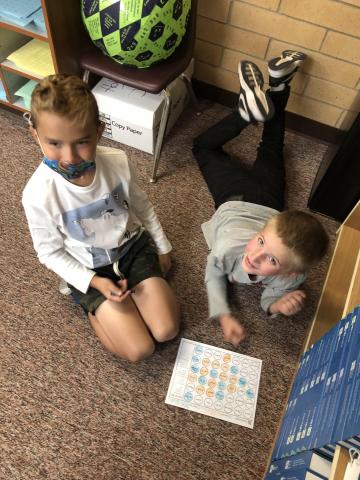 Third Graders playing Connect 4 while learning phonics.