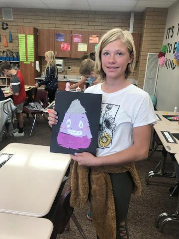 5th grade students create Halloween Rip Art.