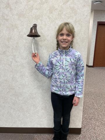 Hazel ringing the bell.